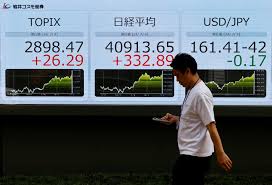 Commodities fall, stocks nervy ahead of Fed, BOJ rate decisions